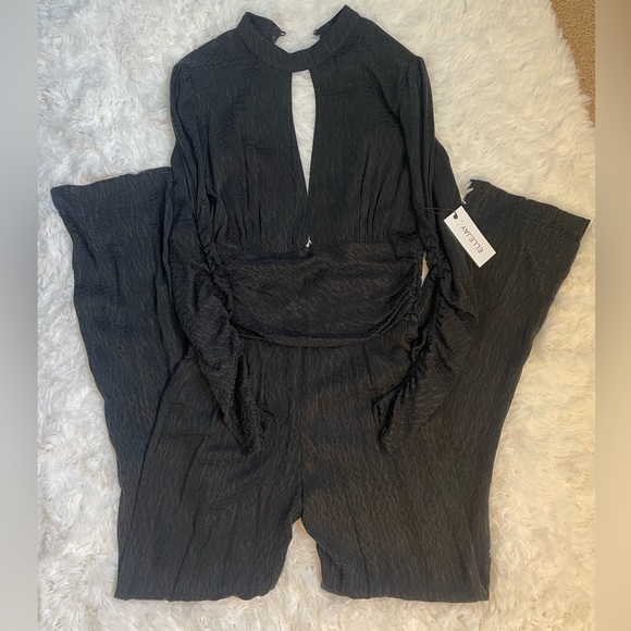 Ellejay Ashley fitted deep neck ruched waist Jumpsuit black animal print size 2 - Picture 2 of 8